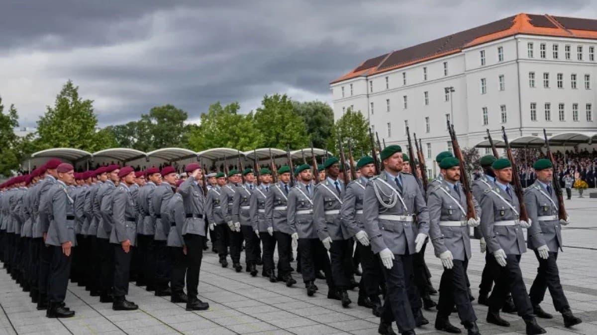 German Bundeswehr soldiers marching in formation during a military ceremony