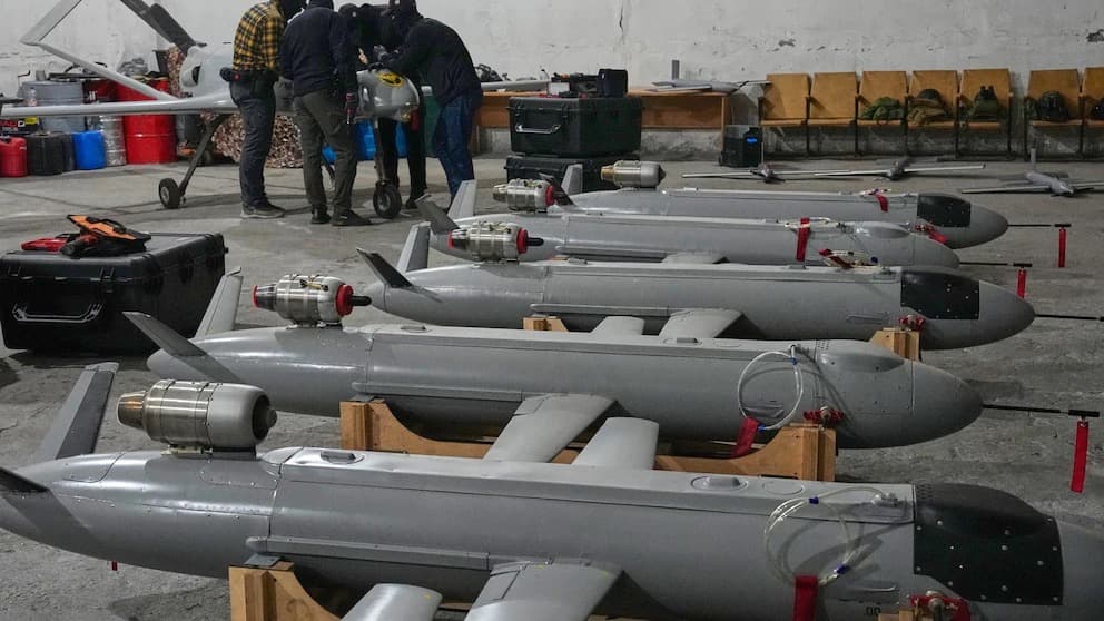 Rows of Ukrainian long-range strike drones lined up in a workshop