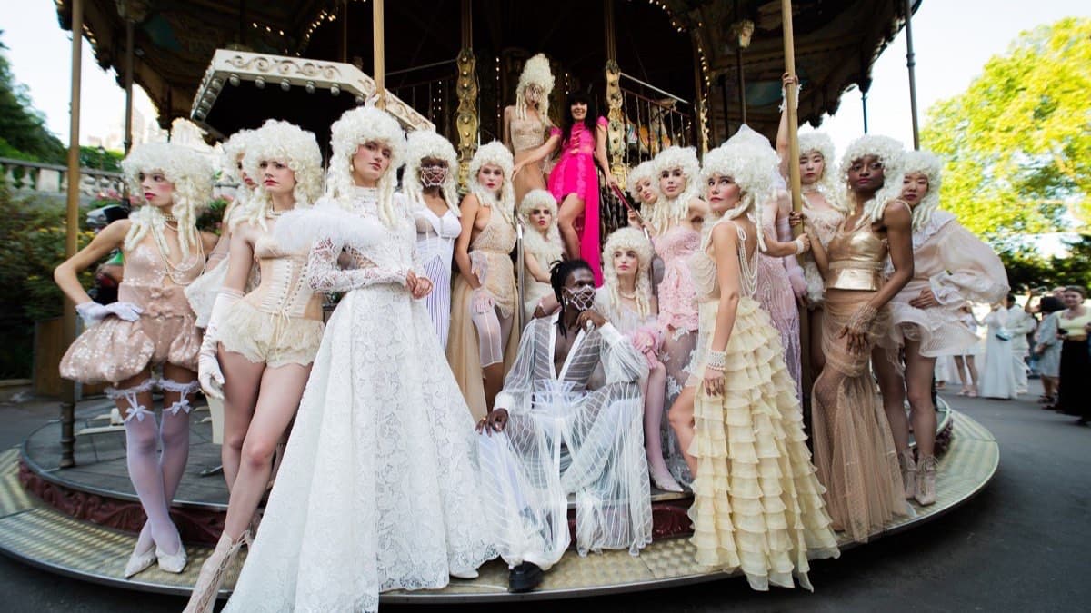 Veronika Jeanvie and more than twenty models in Marie Antoinette inspired couture on the Carrousel de Saint-Pierre in Montmartre